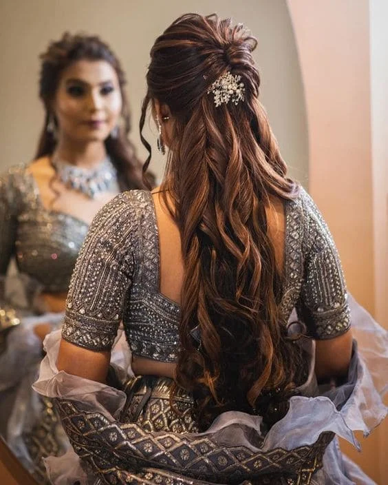 One-side voluminous French braid with flowers | Bridal hair buns, Short  wedding hair, Mehndi hairstyles